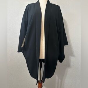 Authentic vintage Japanese kimono black with tonal embroidery ivory lining.